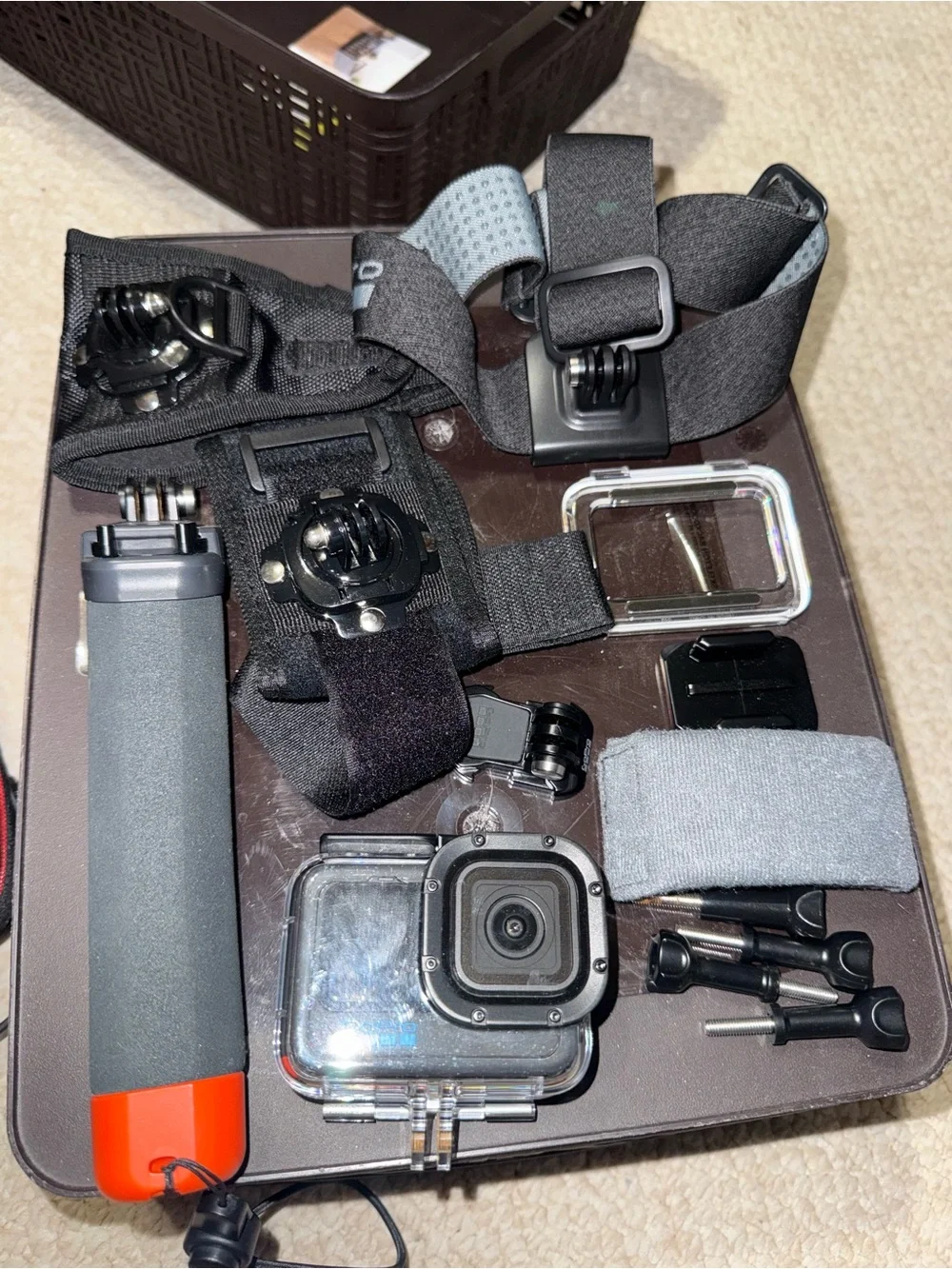 GoPro Accessory Set with Black Mounts and Orange-Tipped Floating Handle